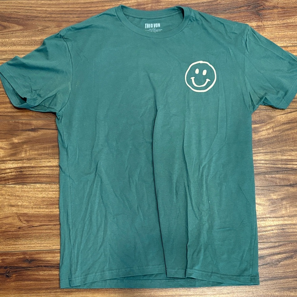 Theo Von. Be Good To Yourself. Green Short Sleeve Tee with Smiley Design